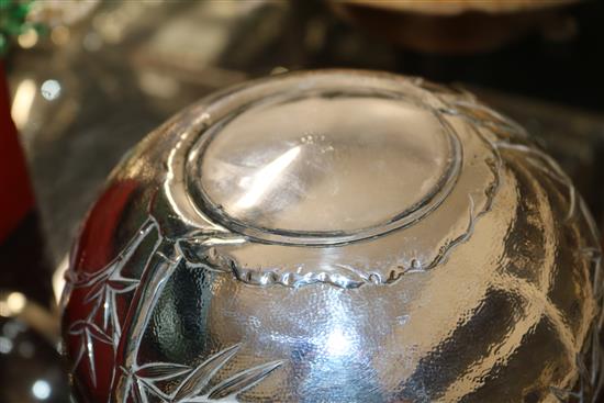 A Japanese foliate-embossed silver bowl on foot (a.f.)